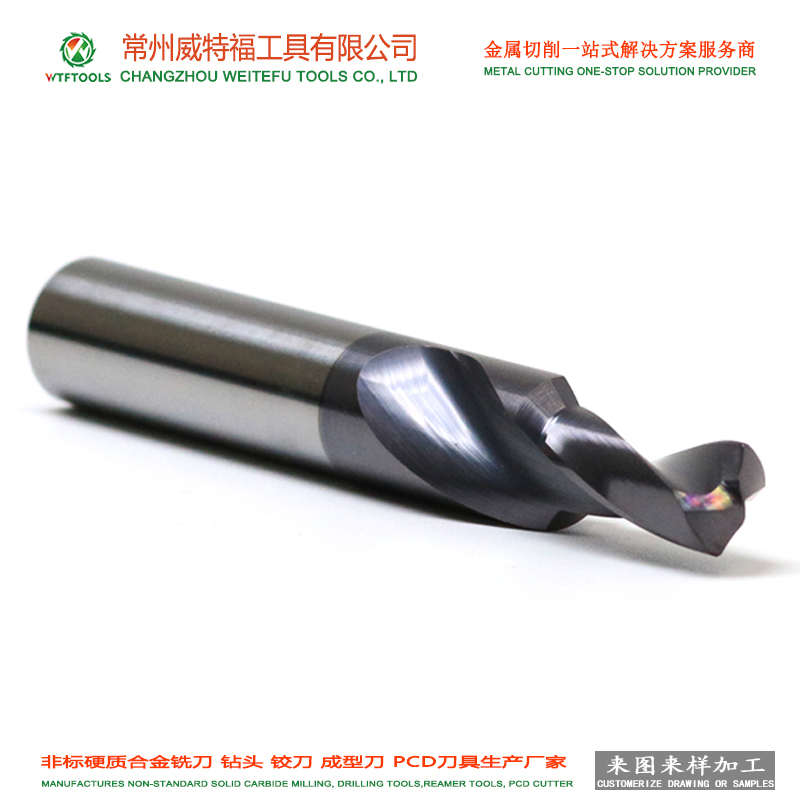 Integral carbide step drilling bit